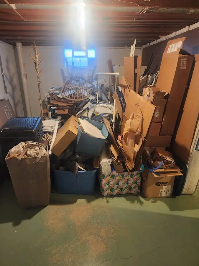 Roll-off dumpster container at job site for 4 Yard Dumpster Rental in Dell Rapids